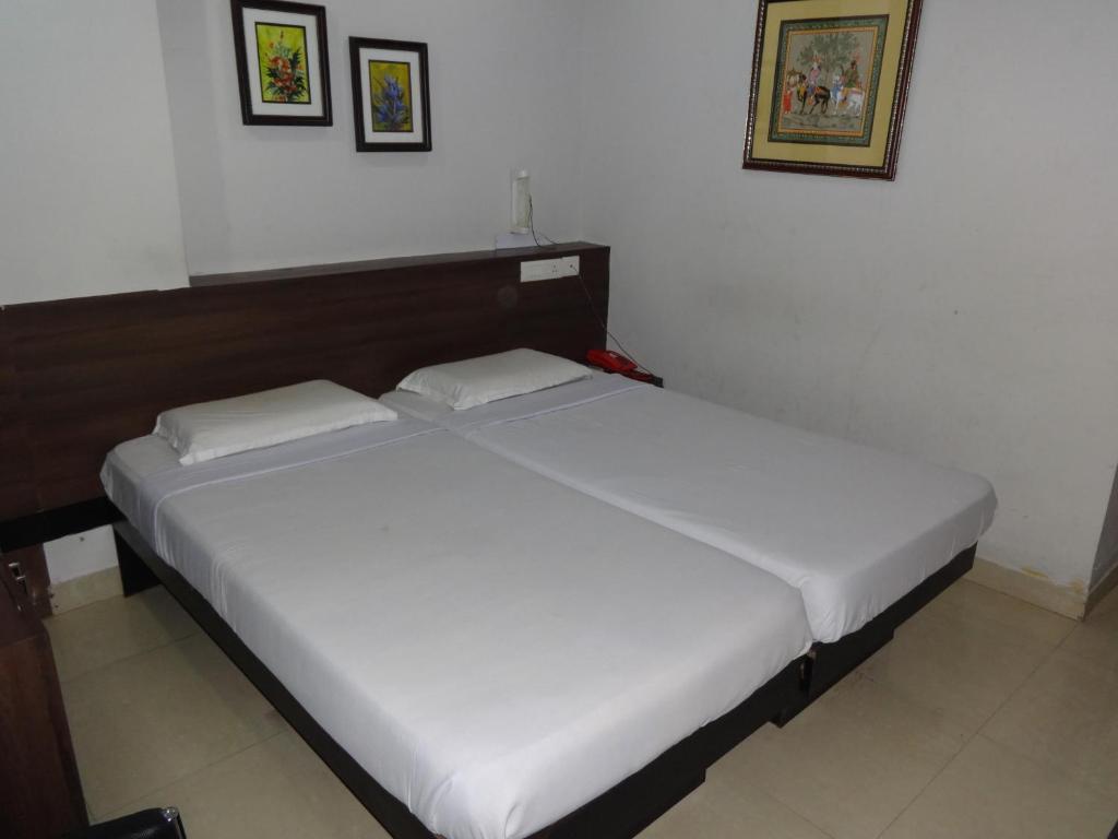 Hotel Miland Palace บูบันเนสชวาร์ ห้อง รูปภาพ